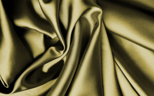 An off-gold colour silk fabric material