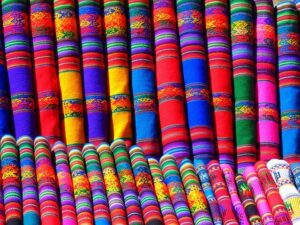 Various assortment of colourful pound fabrics .